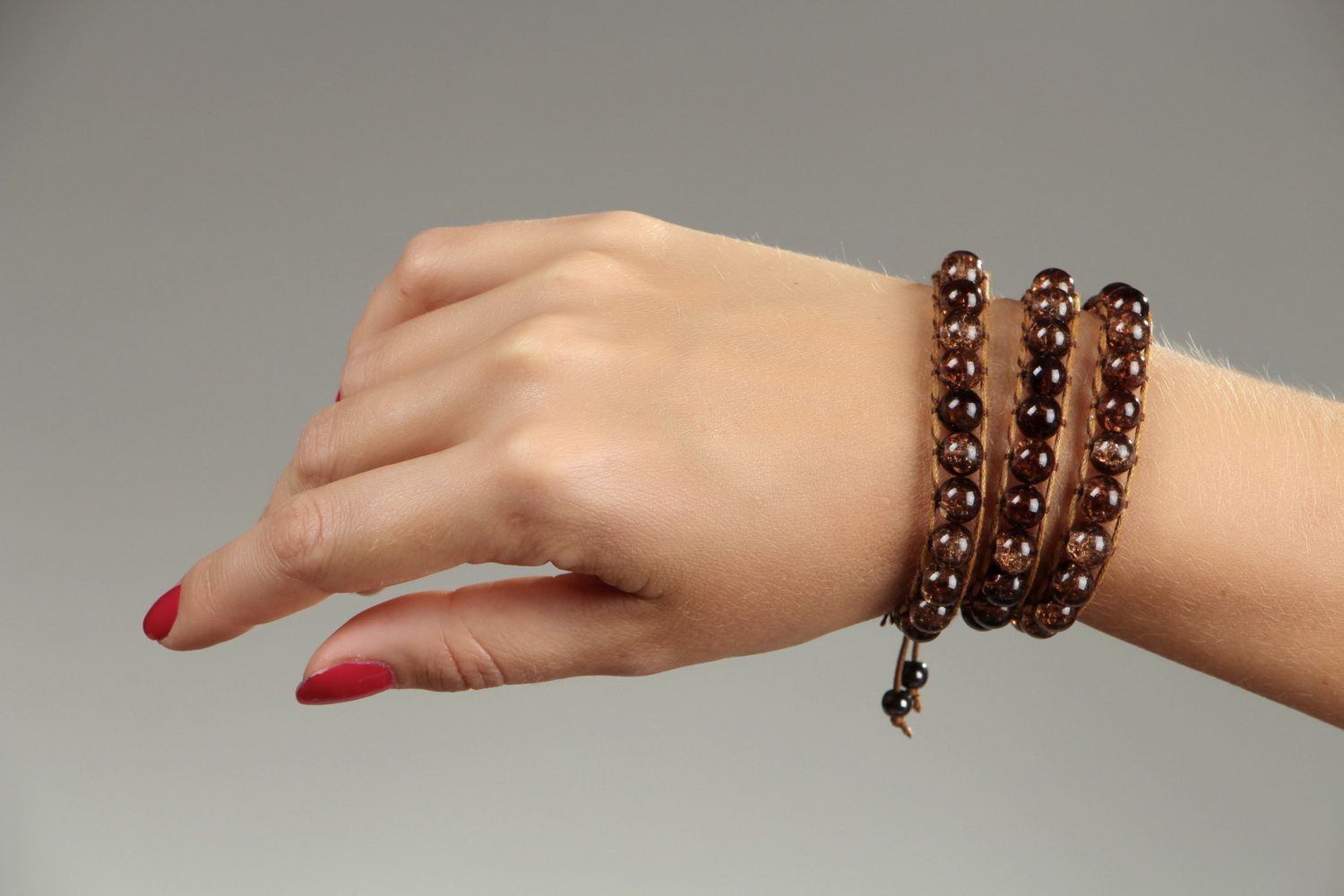 Bracelet en perles marron fait main photo 4