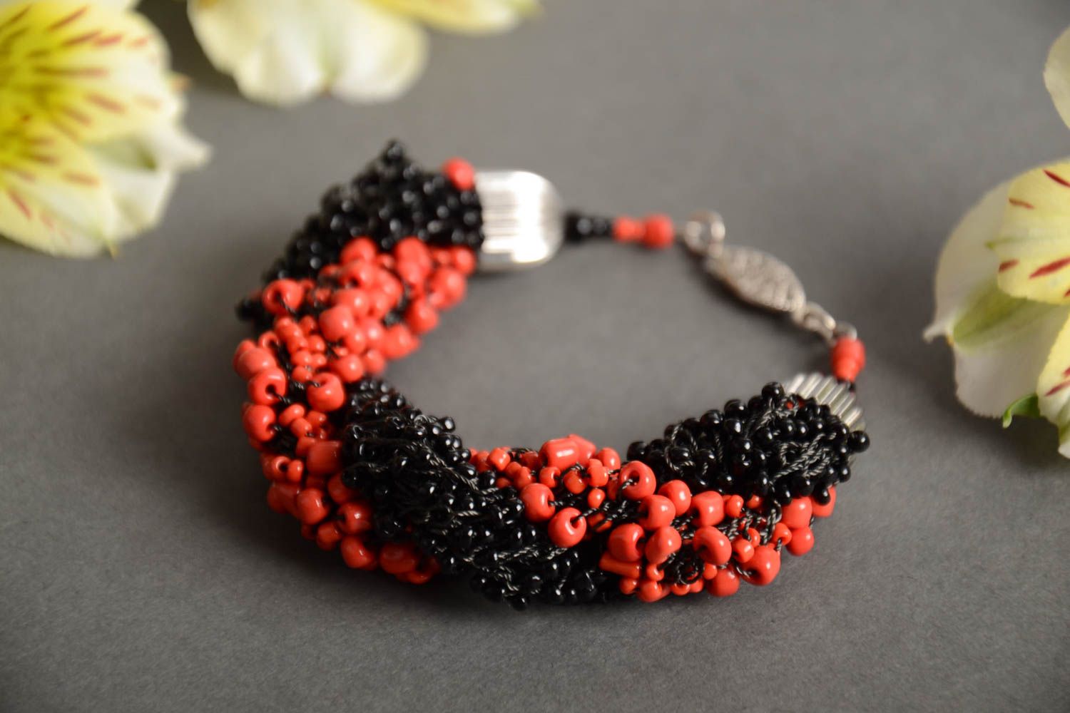 Handmade volume woven wrist bracelet crocheted of red and black Czech beads photo 1