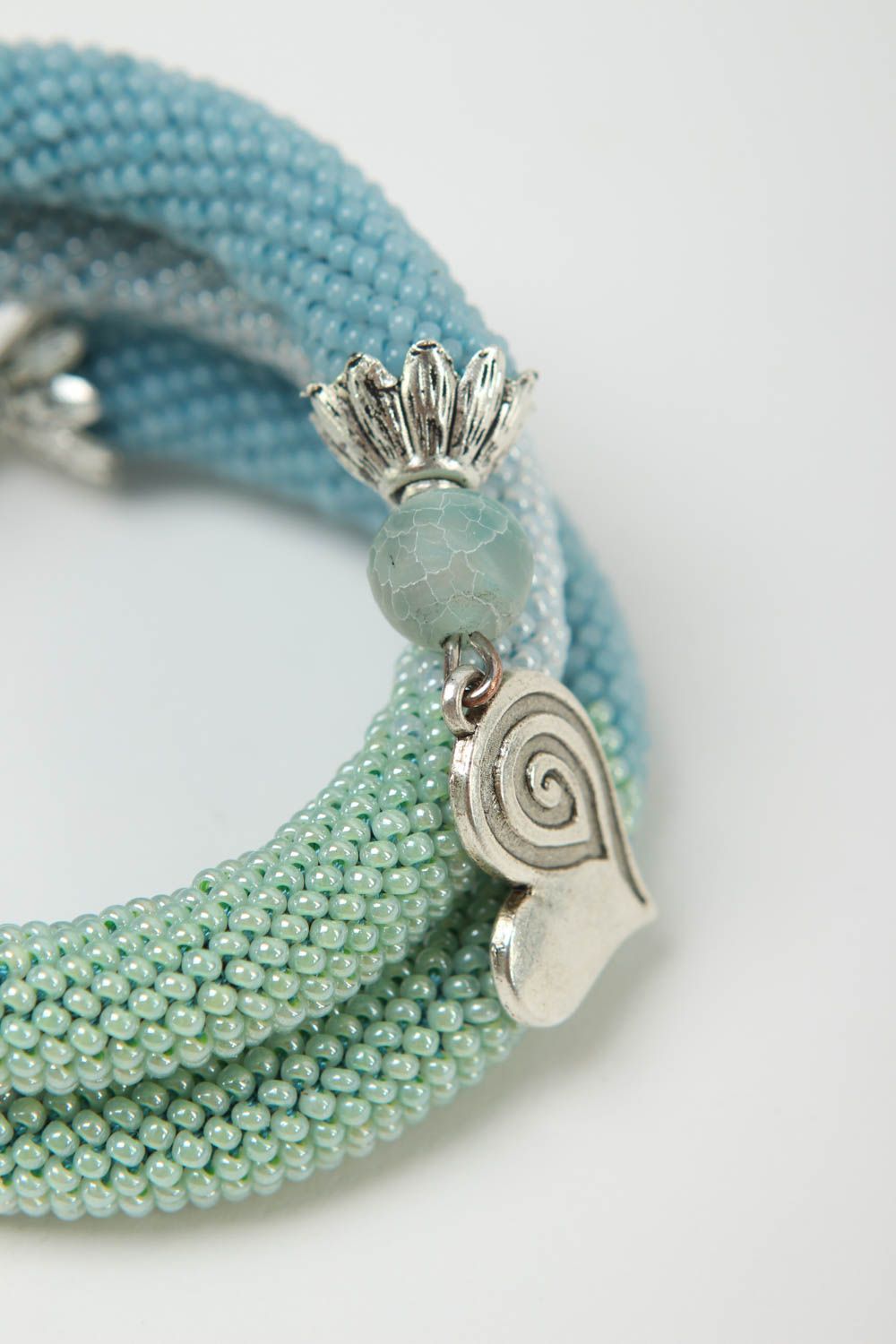 Three-layer cuff cord turquoise color bracelet with silver charms photo 4