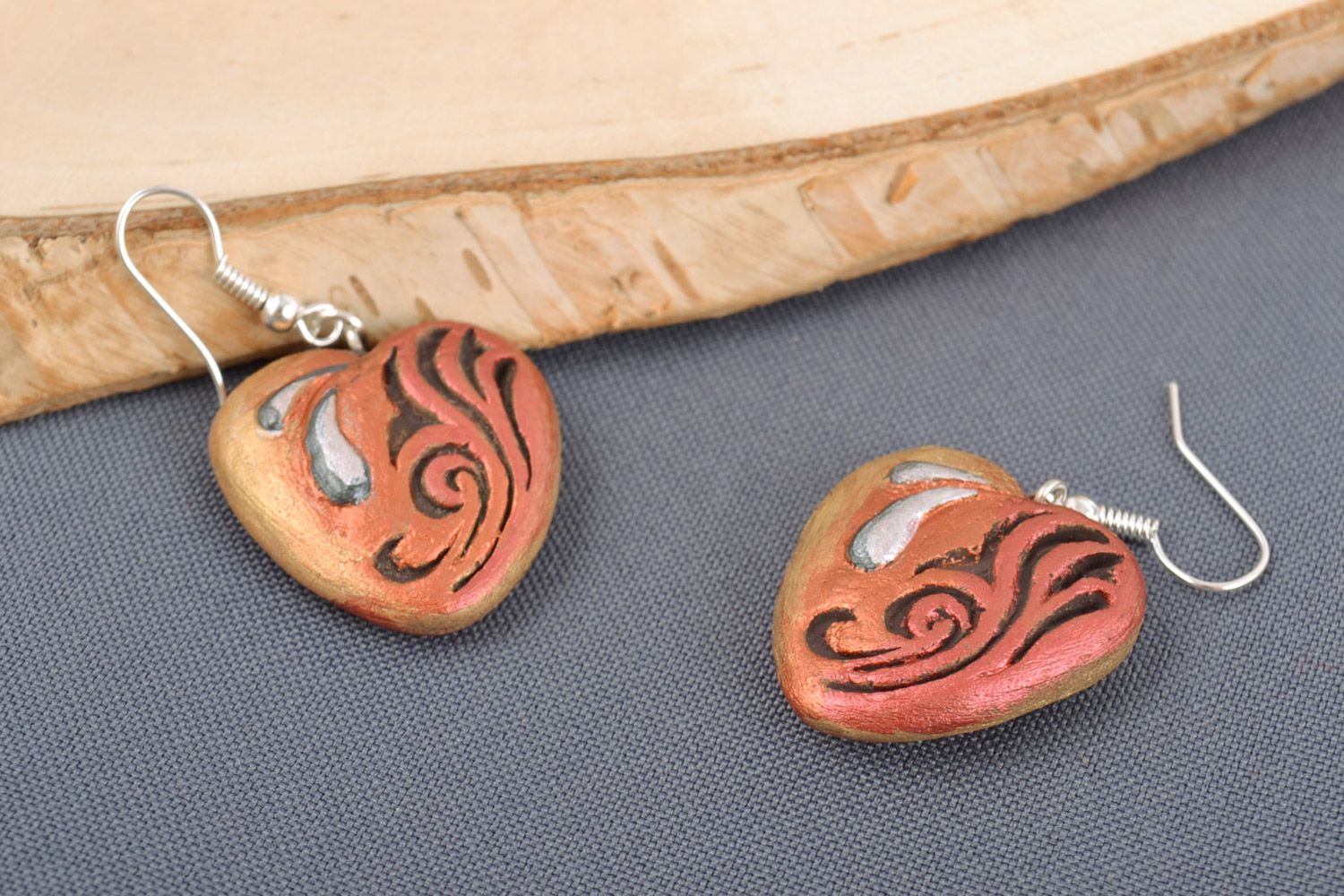 Heart shaped handmade clay earrings painted with acrylics photo 1