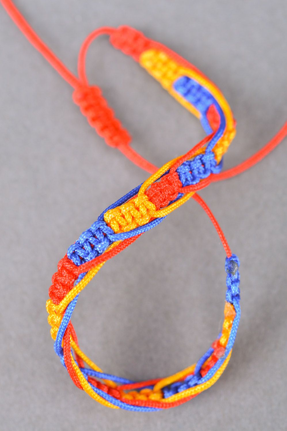 Handmade multi-colored textile bracelet woven of threads for women photo 5