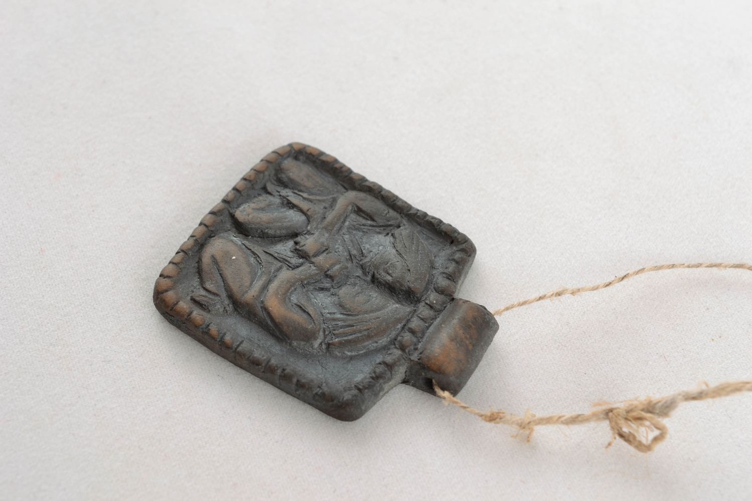 Ethnic pendant made of black-smoked ceramics photo 4