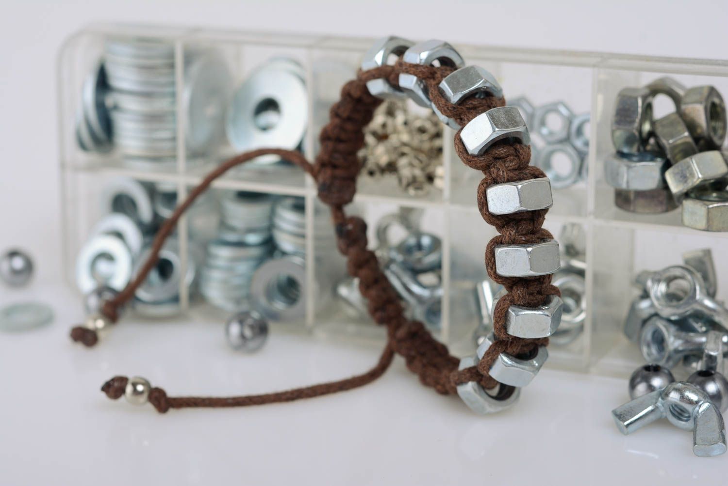 Handmade brown macrame woven cord bracelet with stainless steel nuts photo 2