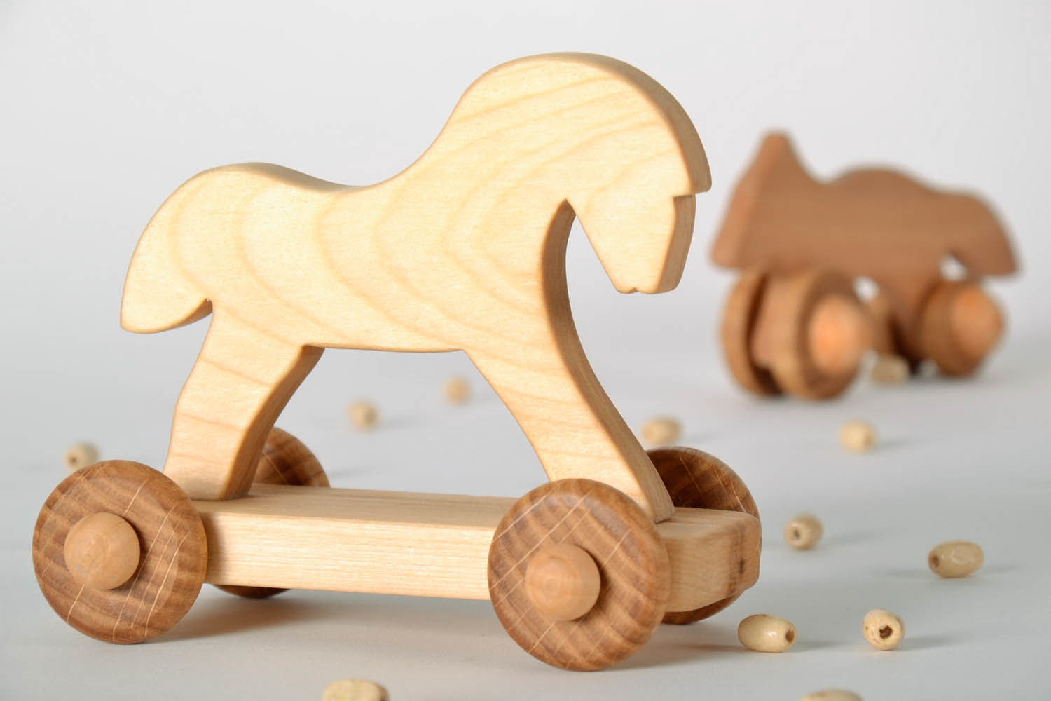 Wooden toy on wheels Horse photo 2