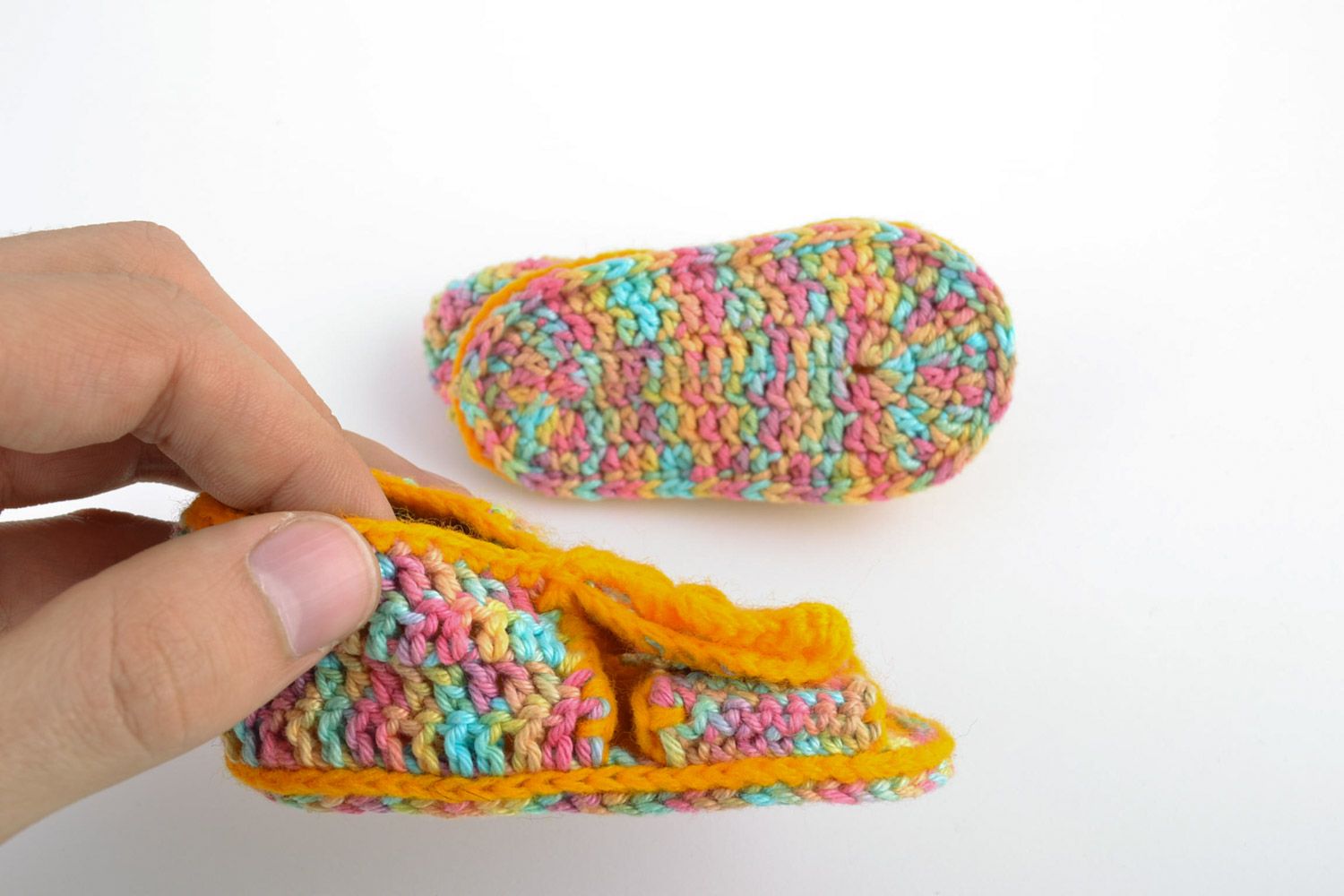 Multi-colored handmade knitted baby booties sandals with yellow flower photo 2