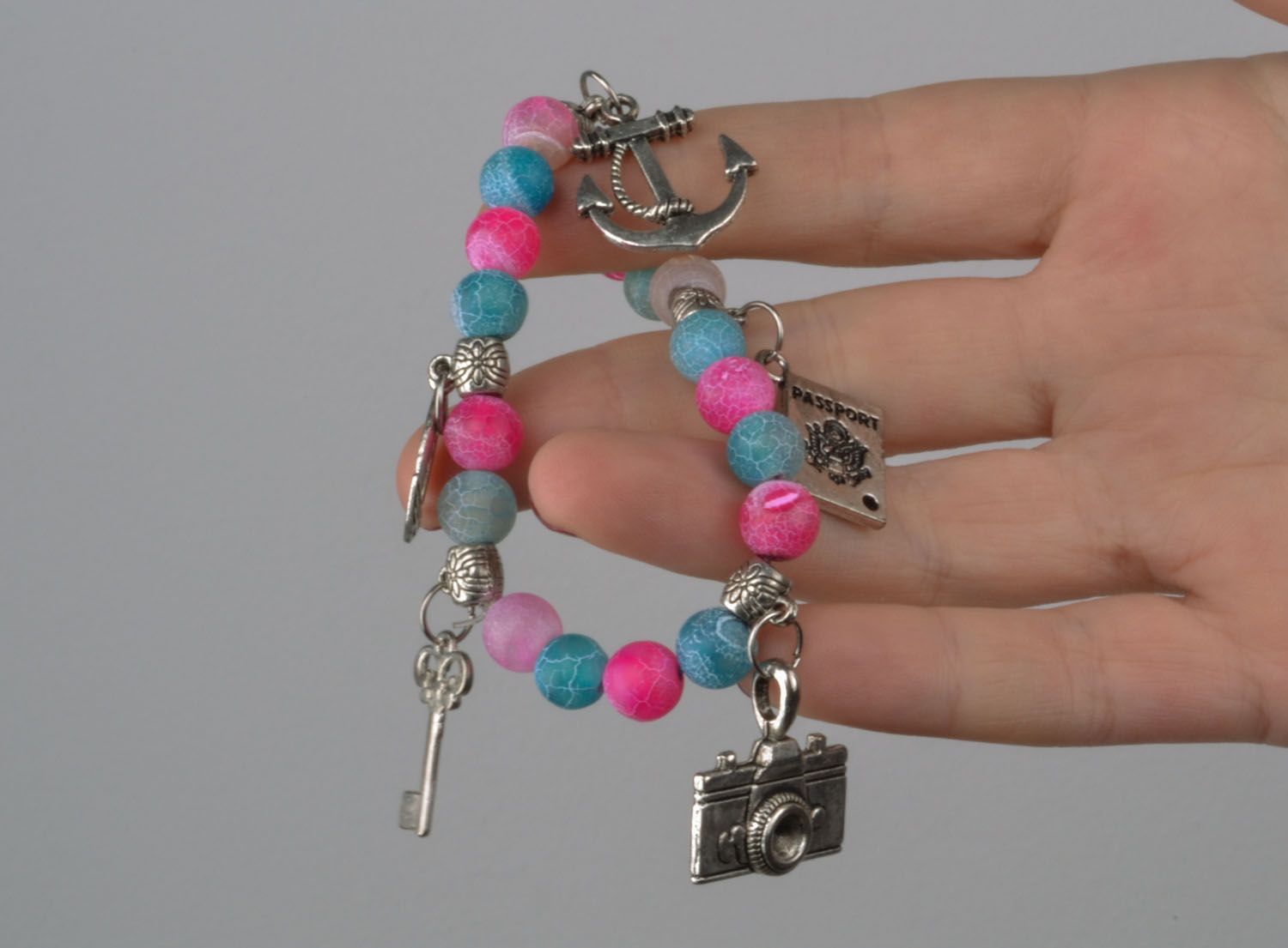Beautiful bracelet with charms photo 4