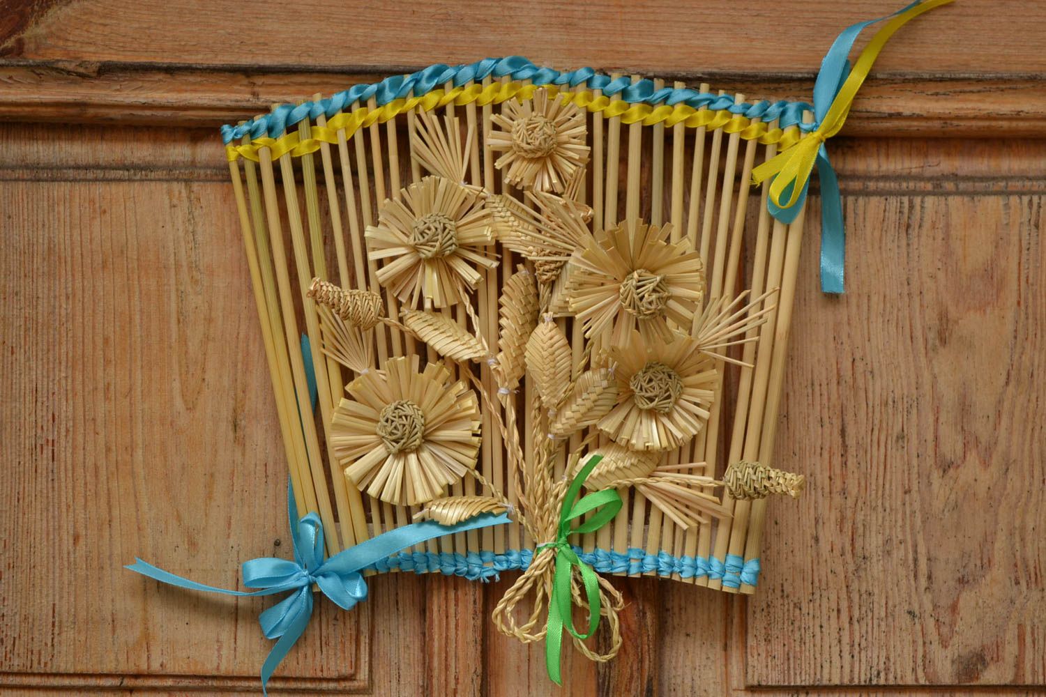Handmade designer unusual beautiful picture made of straw in eco style photo 1