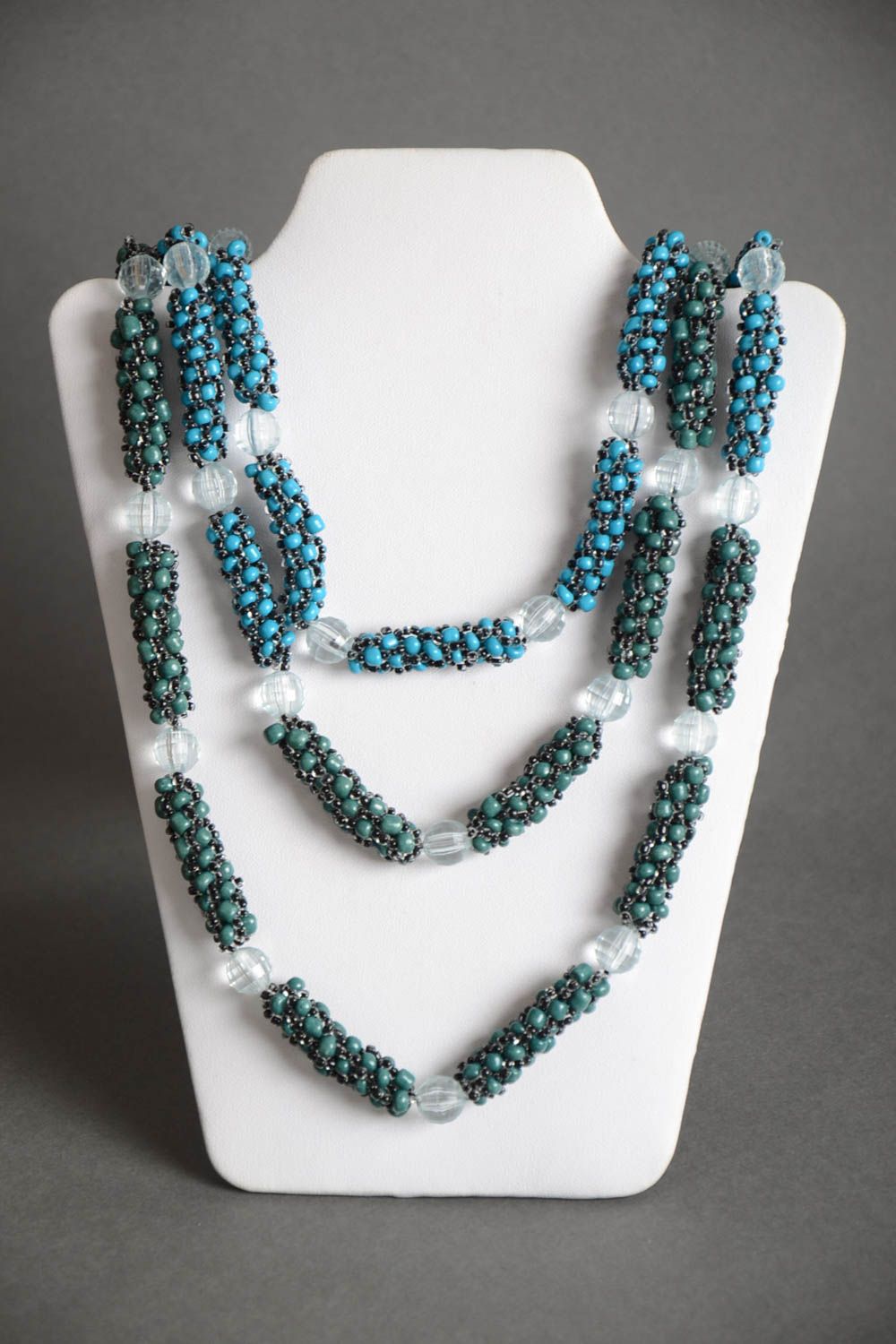 Handmade long women's necklace crocheted of Czech beads of turquoise color photo 2