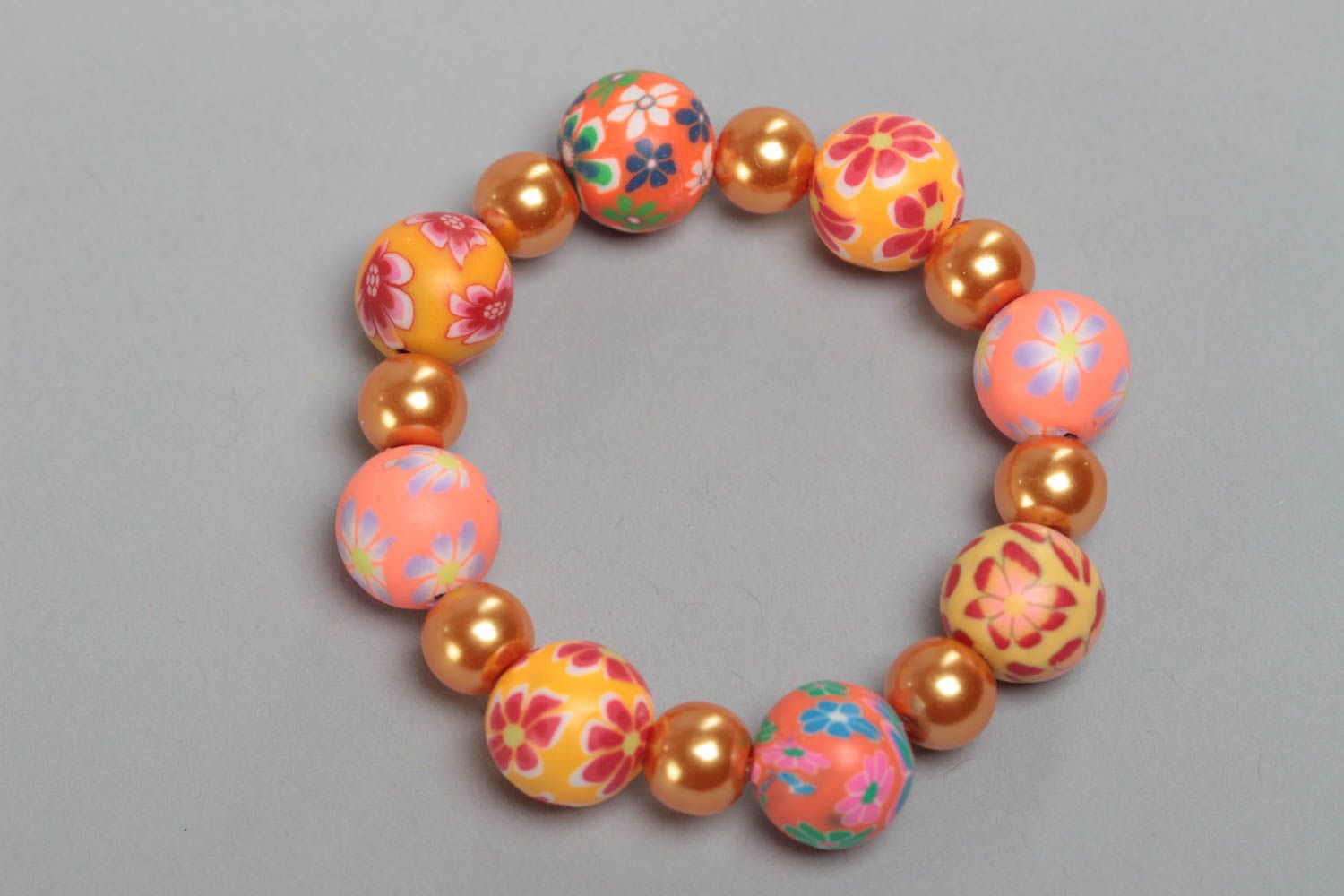 Orange handmade children's bracelet created of polymer clay and ceramic beads photo 4