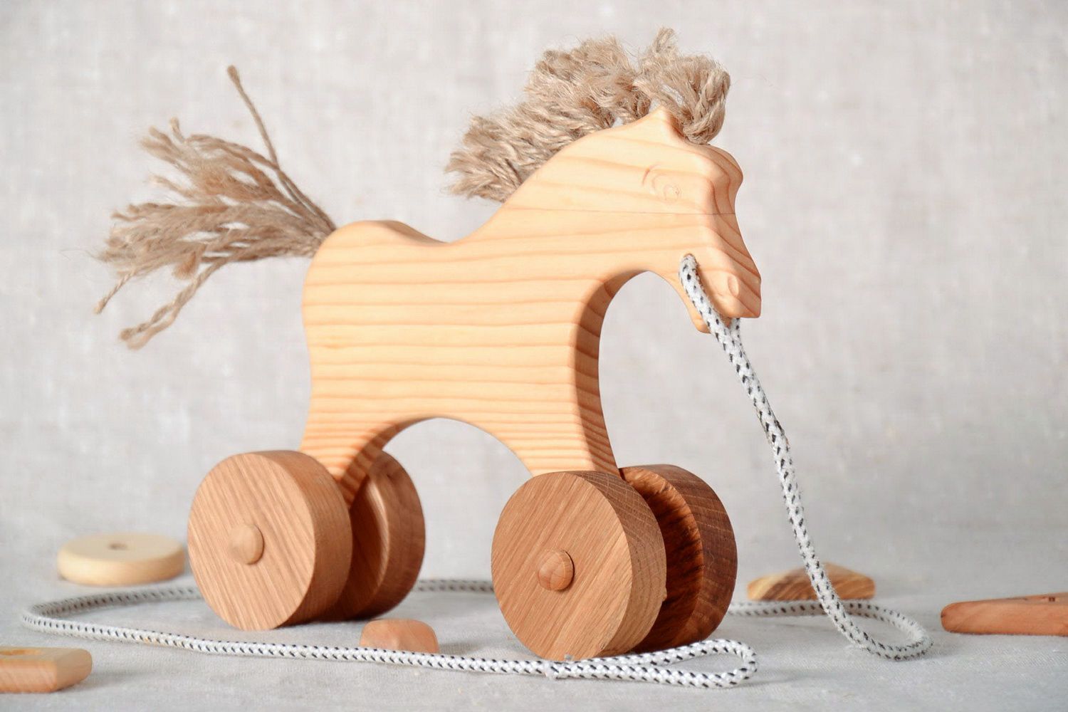 Wooden toy horse on wheels photo 2