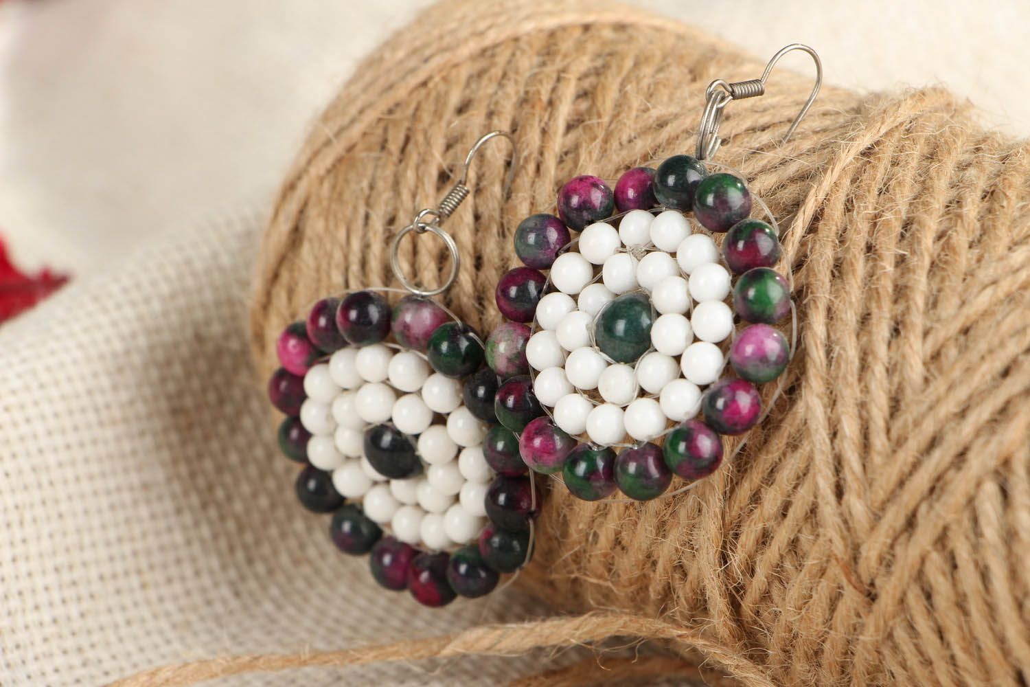 Round earrings made of natural stone photo 3