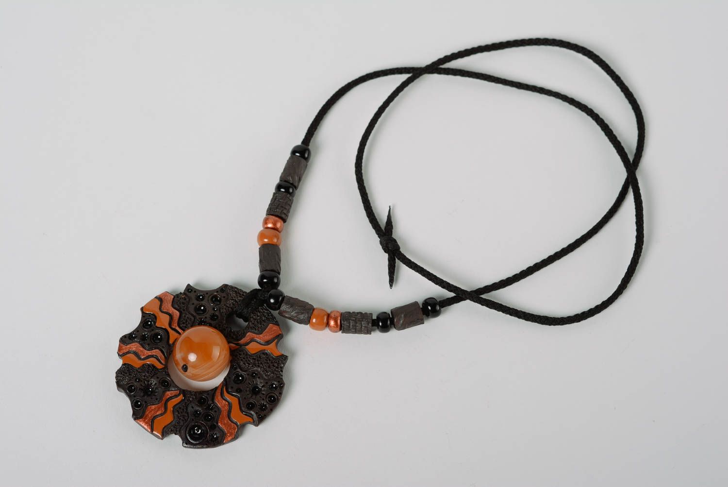 Beautiful handmade ceramic round pendant on cord with painting and beads photo 1