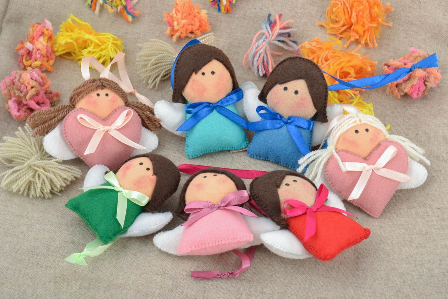 Игрушки с петельками ангелы набор из семи штук разноцветные небольшие хэнд мейд  фото 1