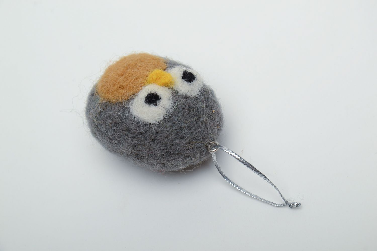 Felted wool toy with eyelet photo 3