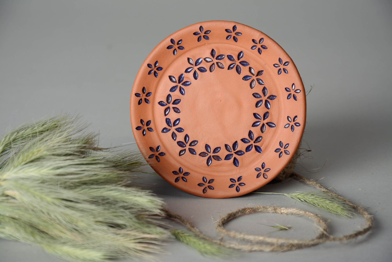 Decorative plate with blue flowers photo 1