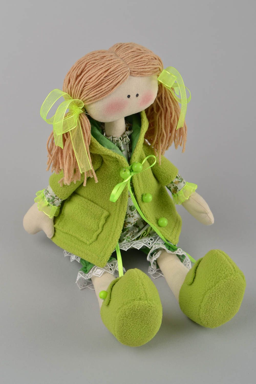 Handmade designer fabric soft doll girl in green clothing with pig tails photo 3