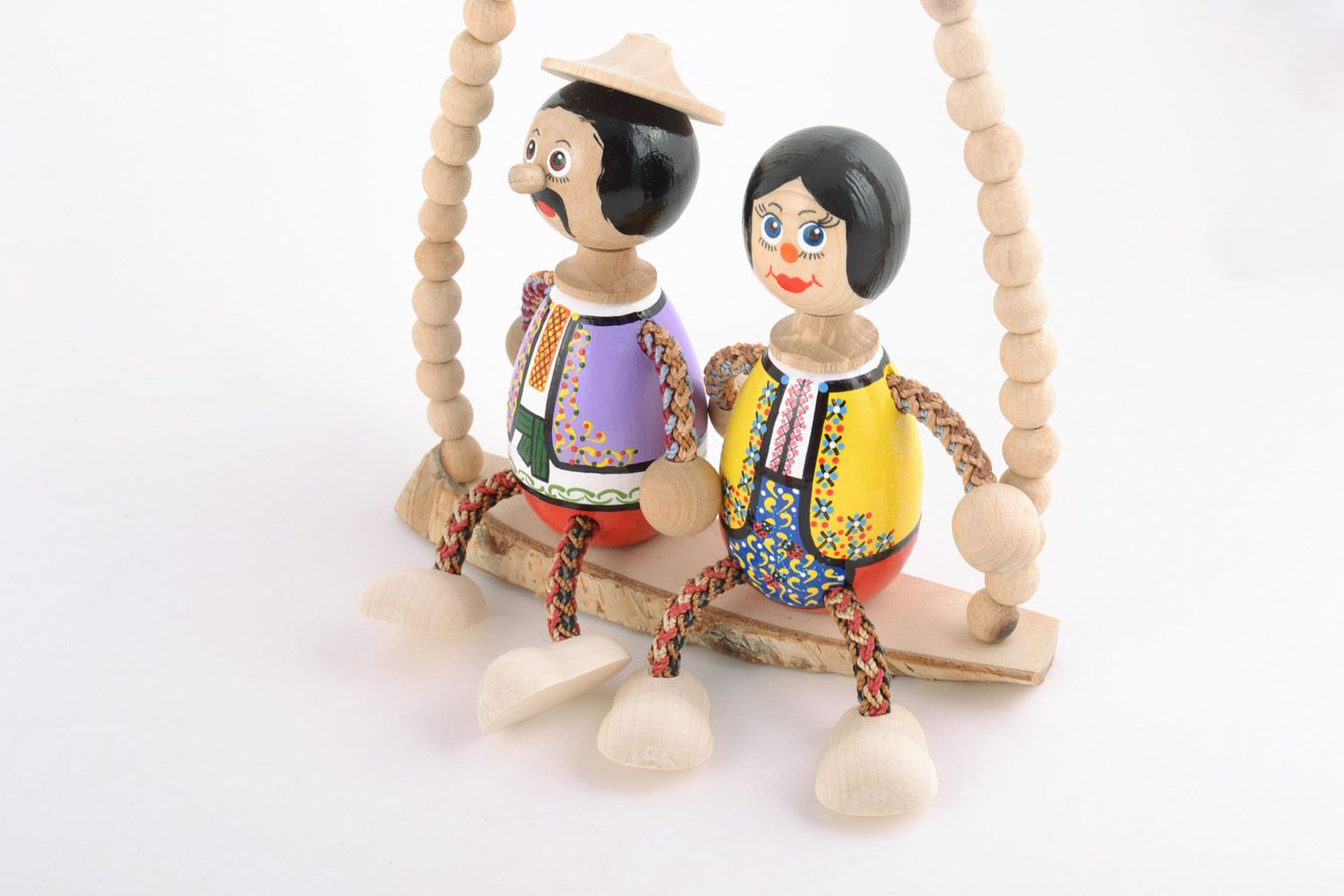 Öko Spielzeug aus Holz auf Sprungfeder mit Bemalung Liebespaar Handarbeit  foto 4