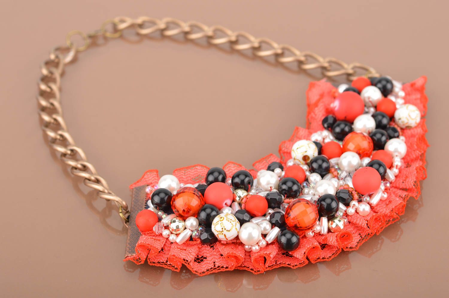 Designer beautiful massive necklace on chain made of metal with beads and lace photo 2