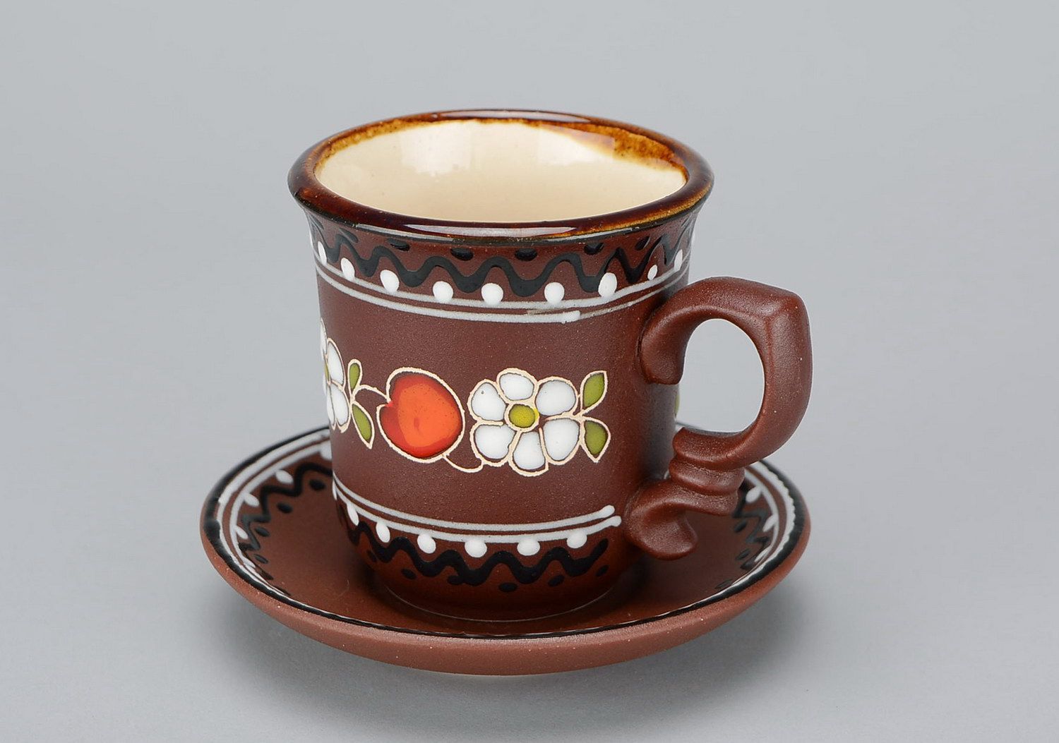 2 oz ceramic glazed decorative brown espresso cup with handle, saucer, and floral pattern photo 1