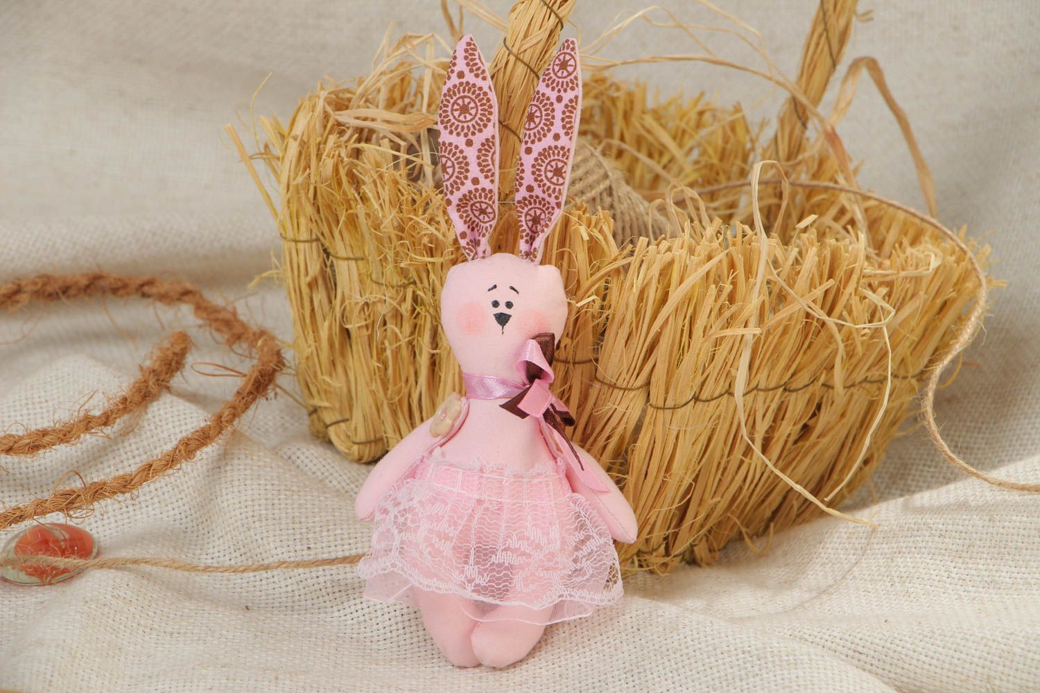 Handmade decorative pink bunny toy made of fabric present for children  photo 1