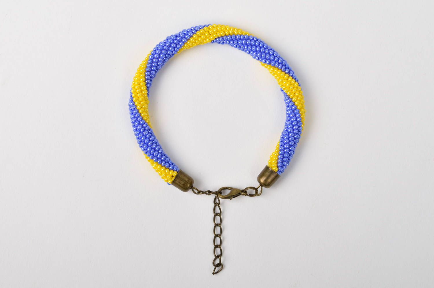 Бисерный жгут украшение ручной работы бижутерия из бисера браслет желто-голубой фото 5