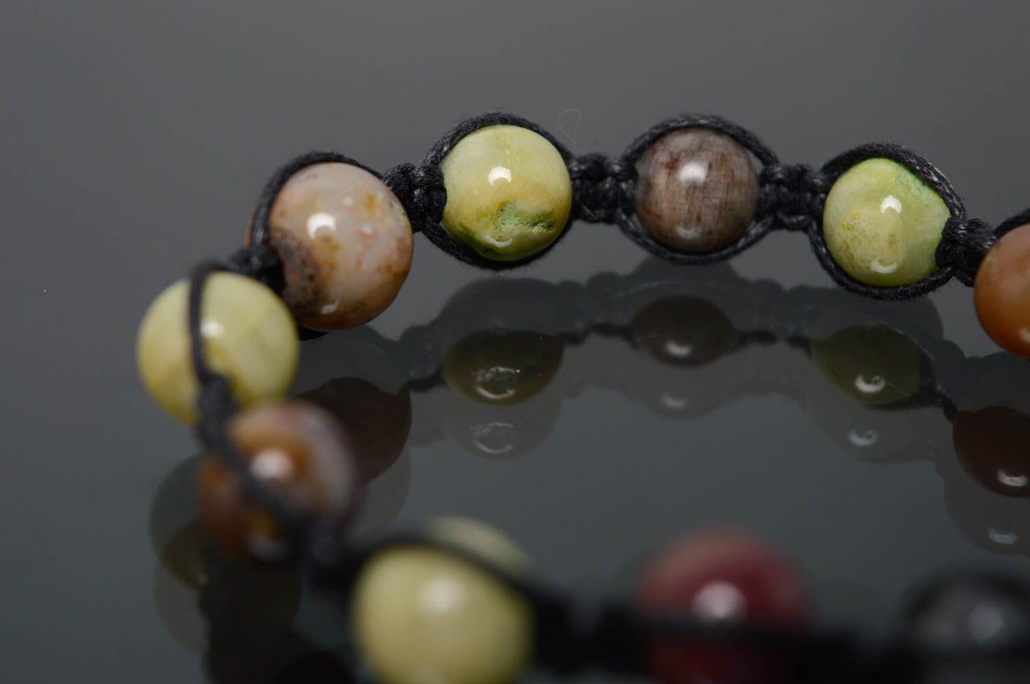 Woven bracelet with natural stones photo 2