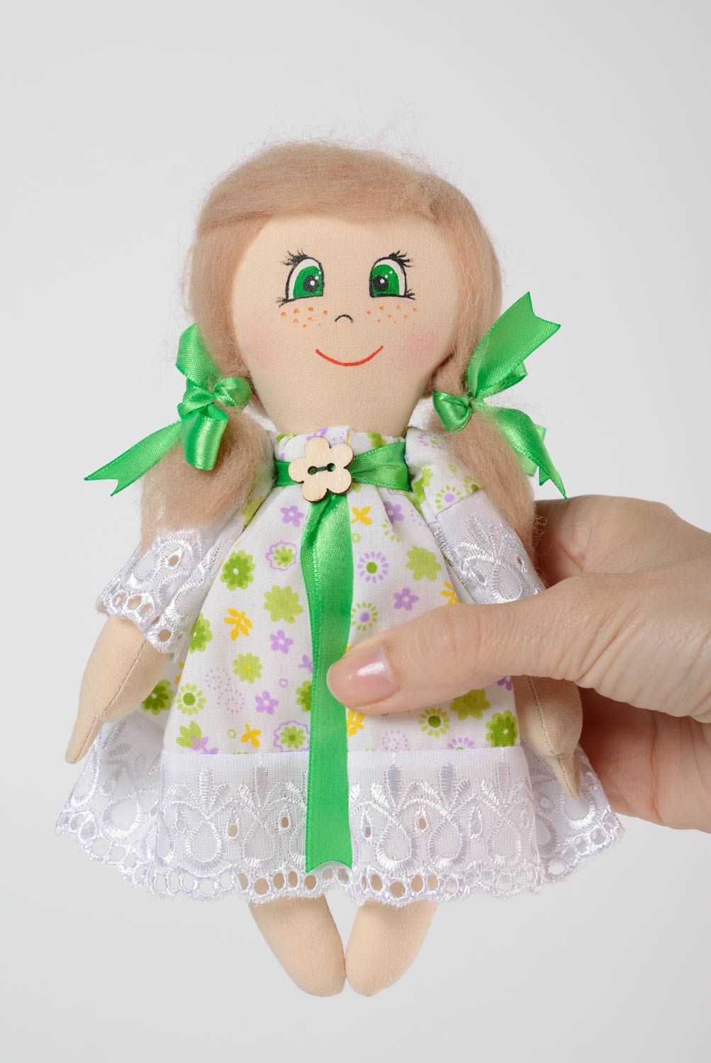 Handmade cotton fabric soft doll girl in floral dress with green ribbons photo 5
