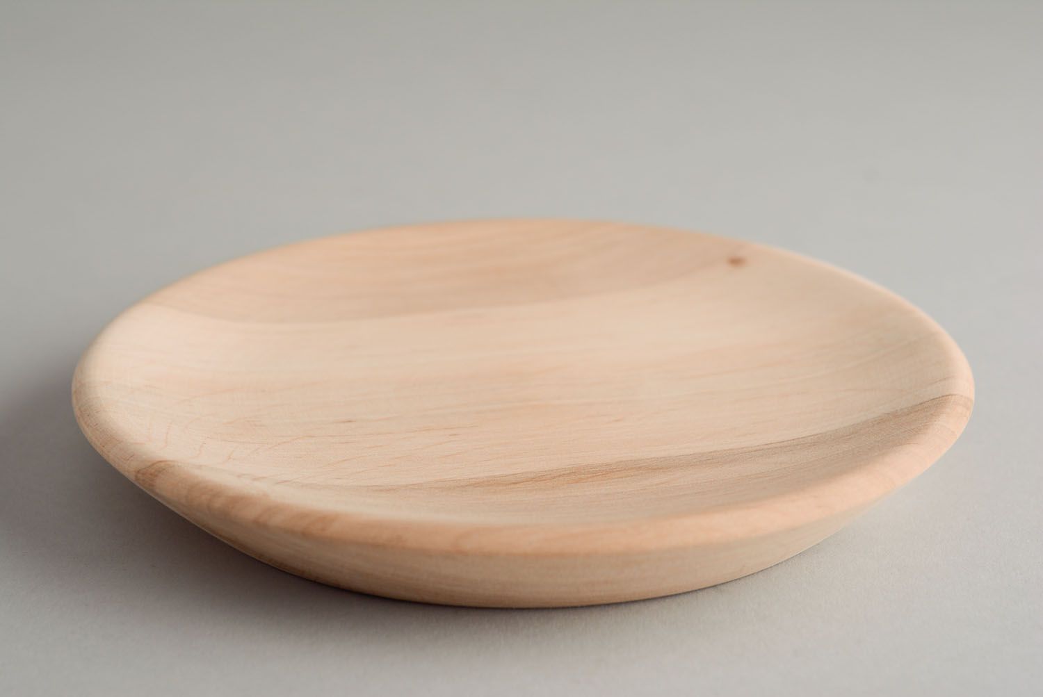 Base de madera hecha a mano con forma de plato foto 1