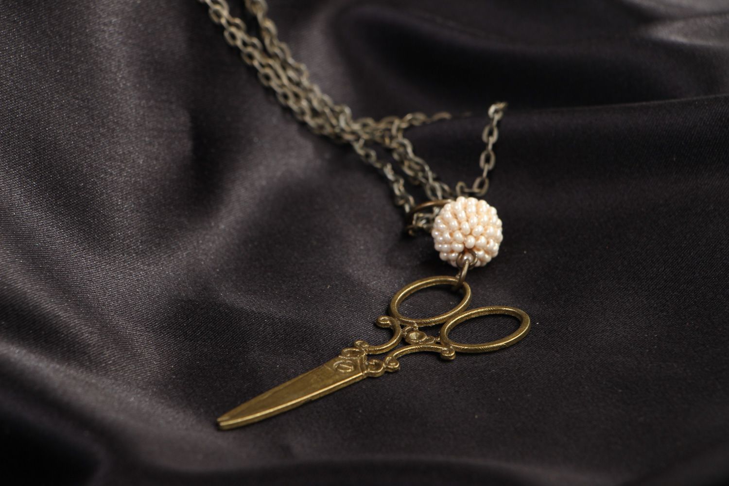 Handmade pendant on a long chain with metal charm in the shape of scissors  photo 5