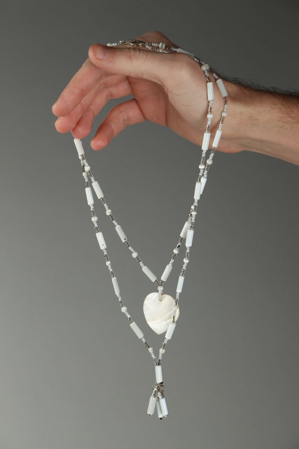 Necklace with white cat's eye stone photo 4
