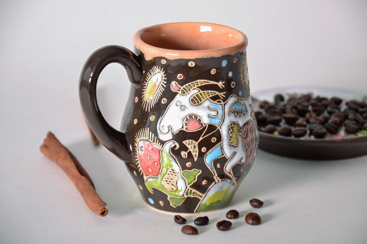 Art glazed ceramic drinking cup with colorful pattern brown color and handle photo 1