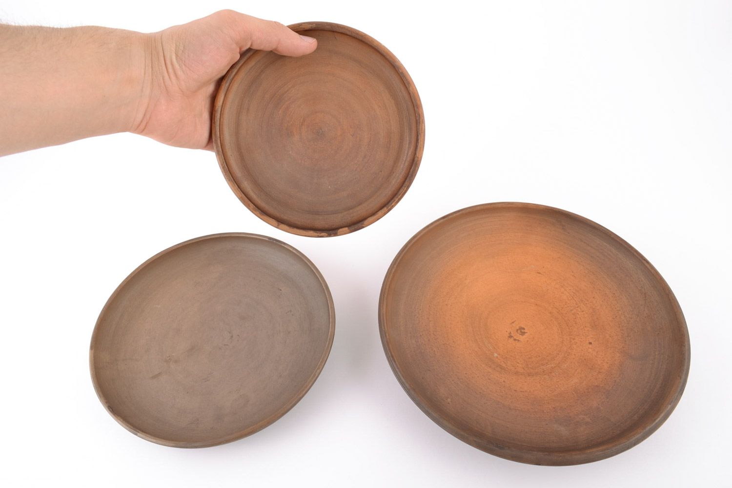 Set of handmade ceramic plates 3 pieces made using milk firing technique photo 2