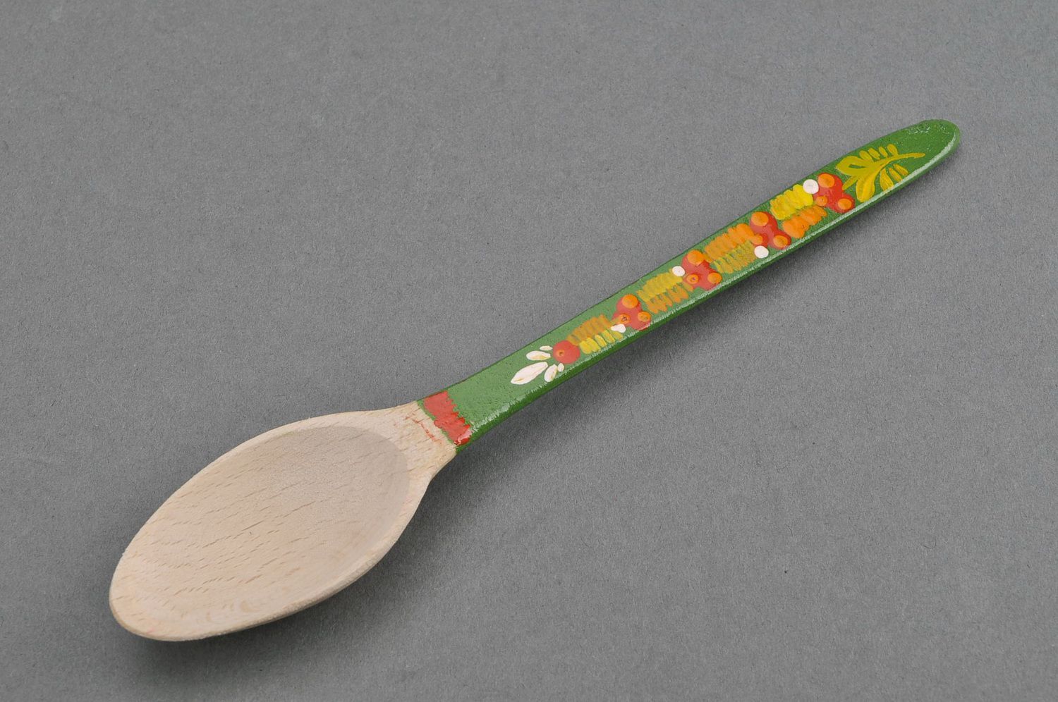 Wooden teaspoon with green handle photo 2