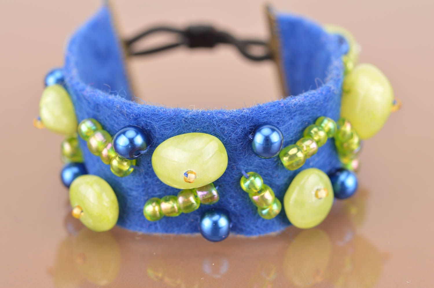 Unusual cute handmade blue wrist bracelet made of felt with green beads photo 2