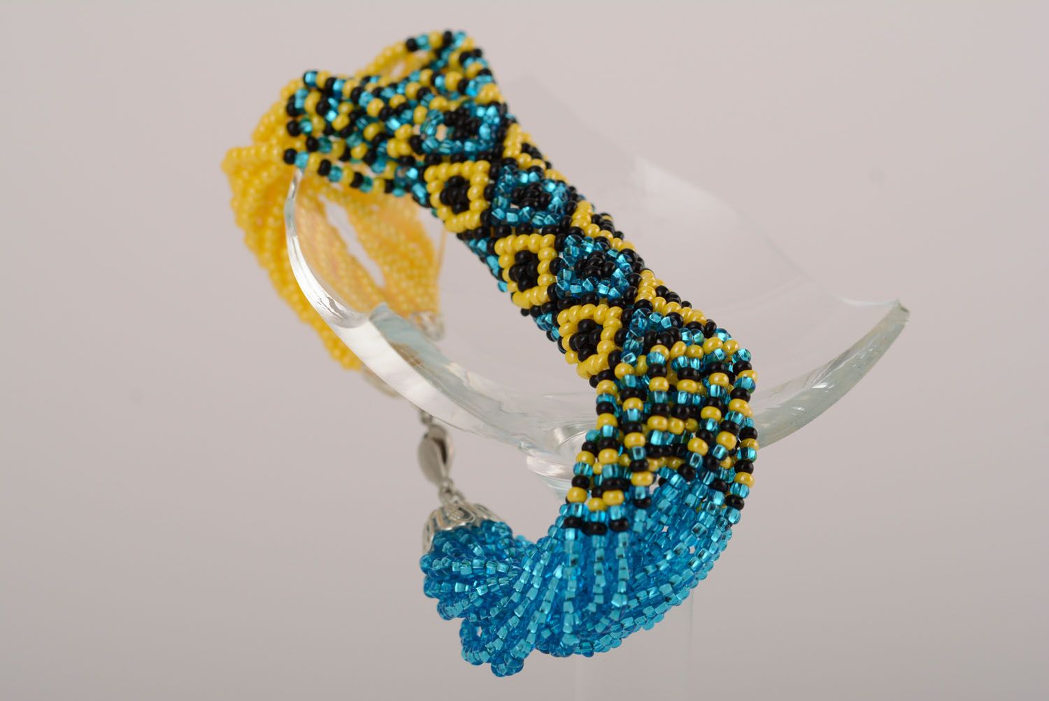 Bracelet en perles de rocaille ethnique bleu jaune noir photo 2