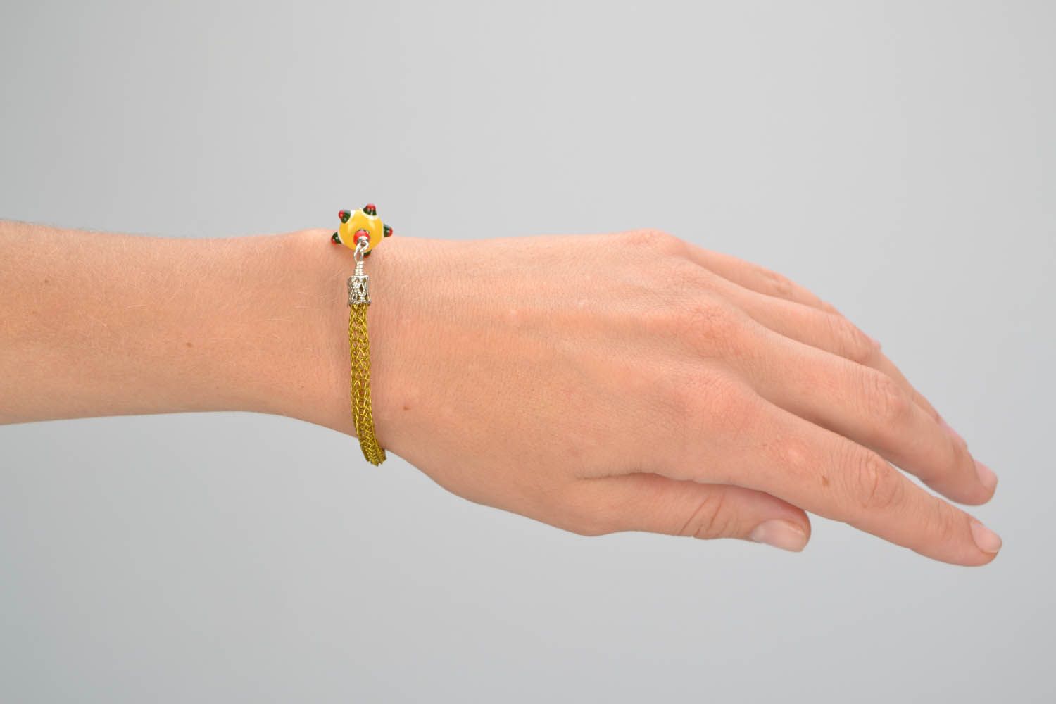 Gelbes handgemachtes Armband foto 2
