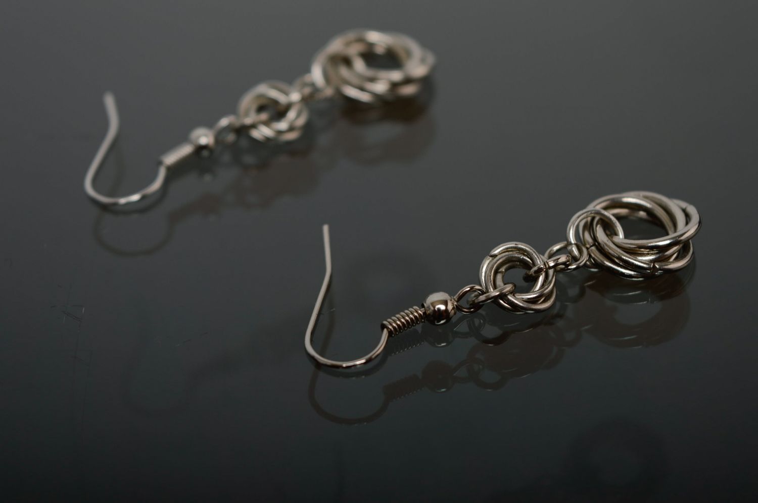 Handmade metal earrings created using chain armor weaving technique photo 4
