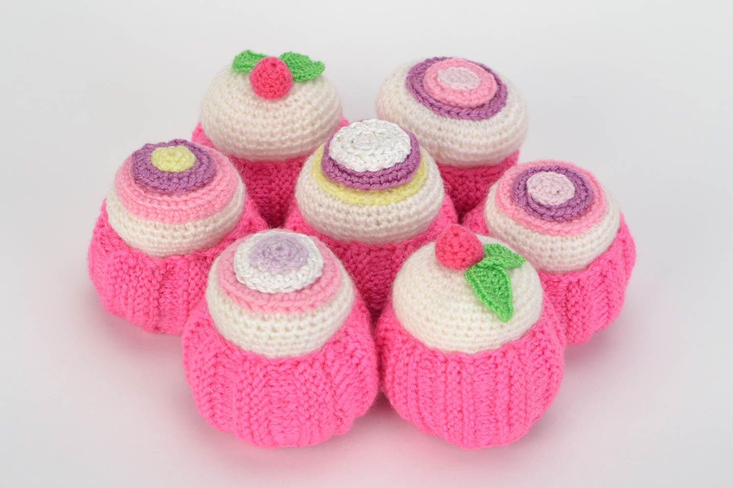 Set of 7 handmade soft interior crochet toys in the shape of small pink cakes photo 1