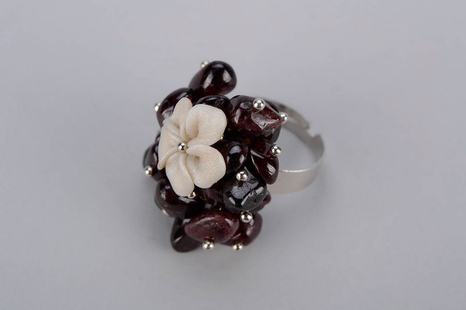 Ring with garnet and polymer clay photo 1