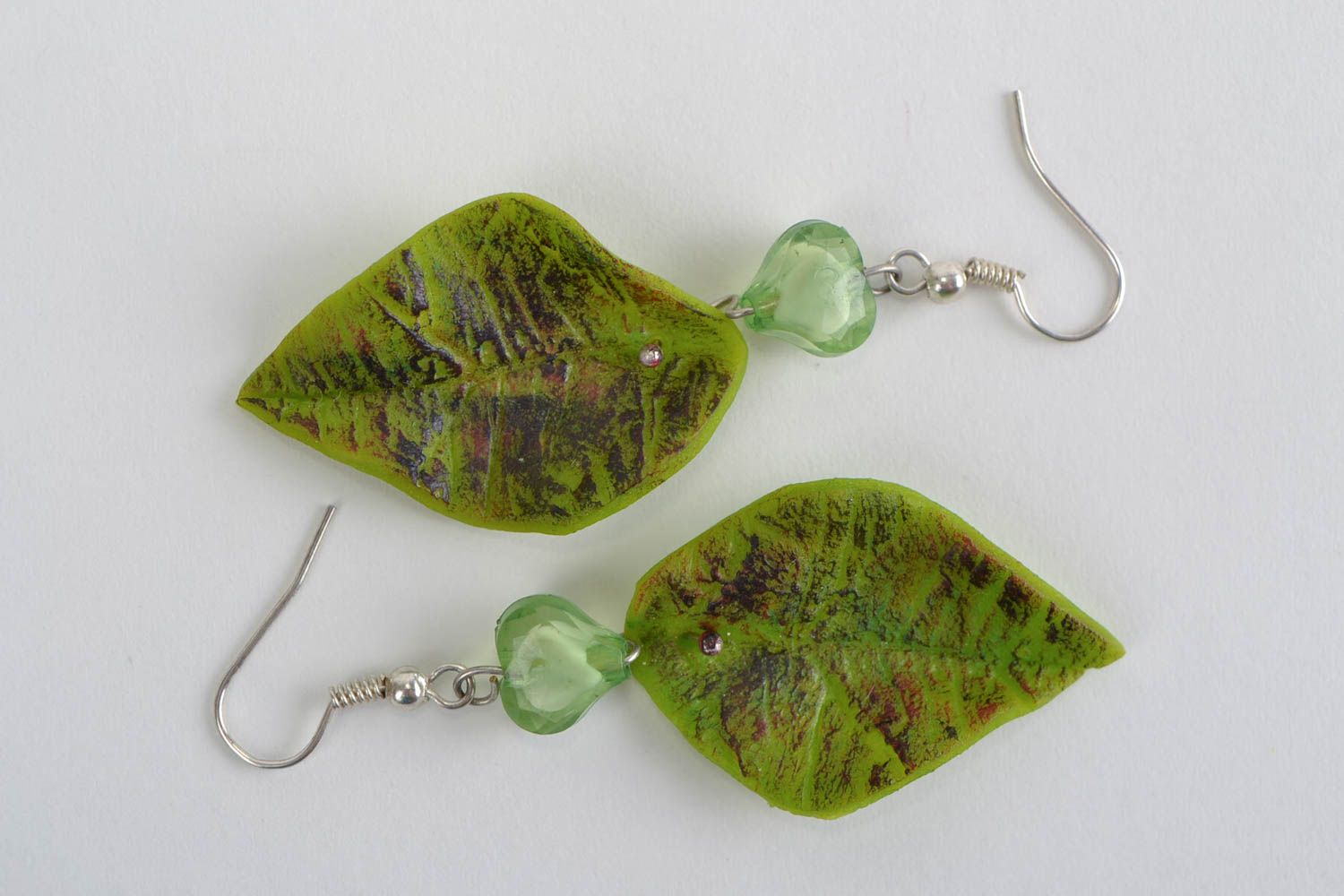 Large handmade green polymer clay earrings in the shape of leaves photo 3