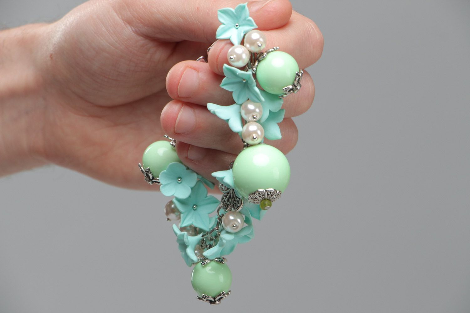 Handmade beautiful designer flower bracelet with charms made of polymer clay in mint color photo 6
