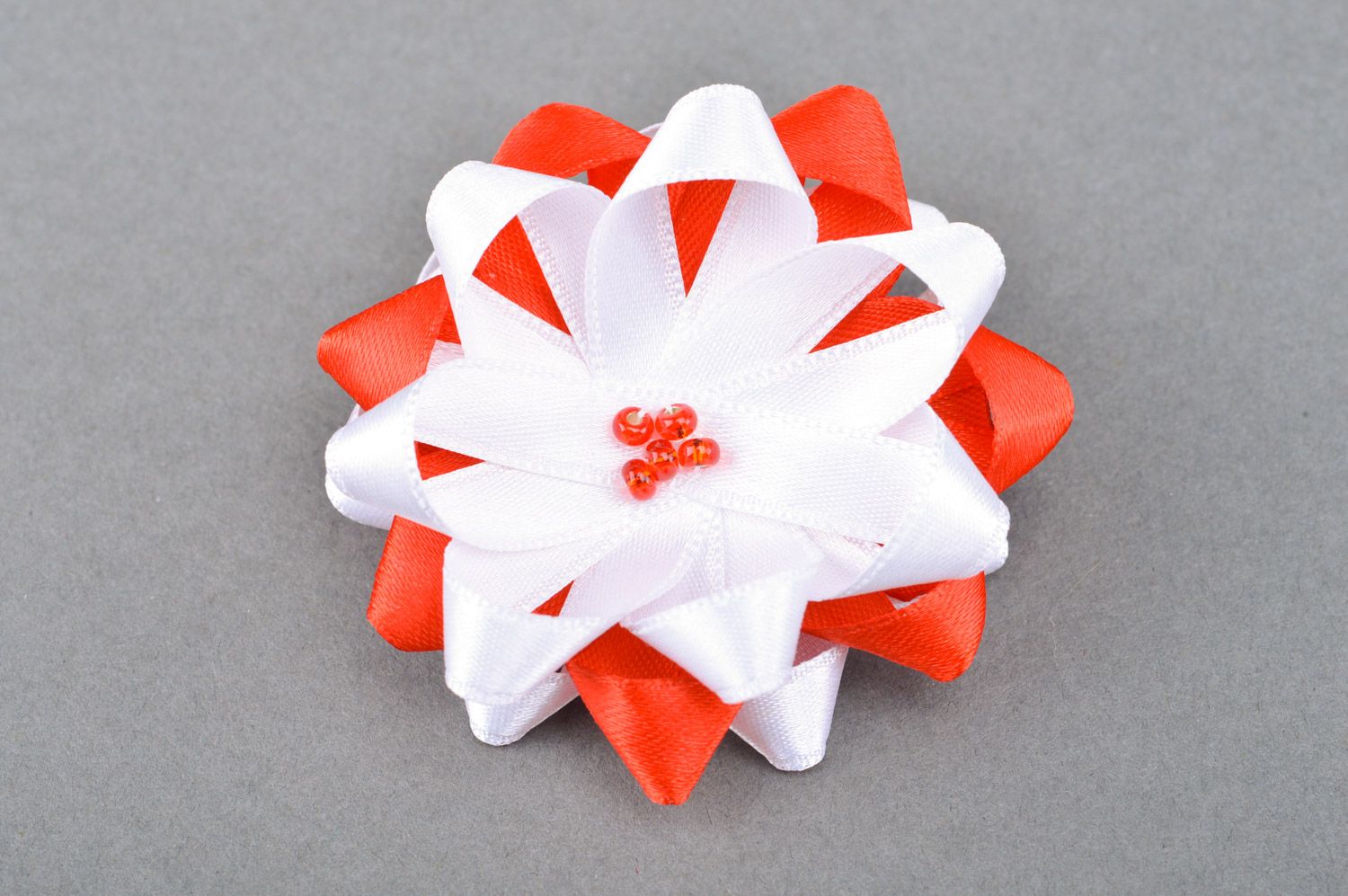 Handmade decorative hair tie with flower sewn of red and white satin ribbons  photo 2
