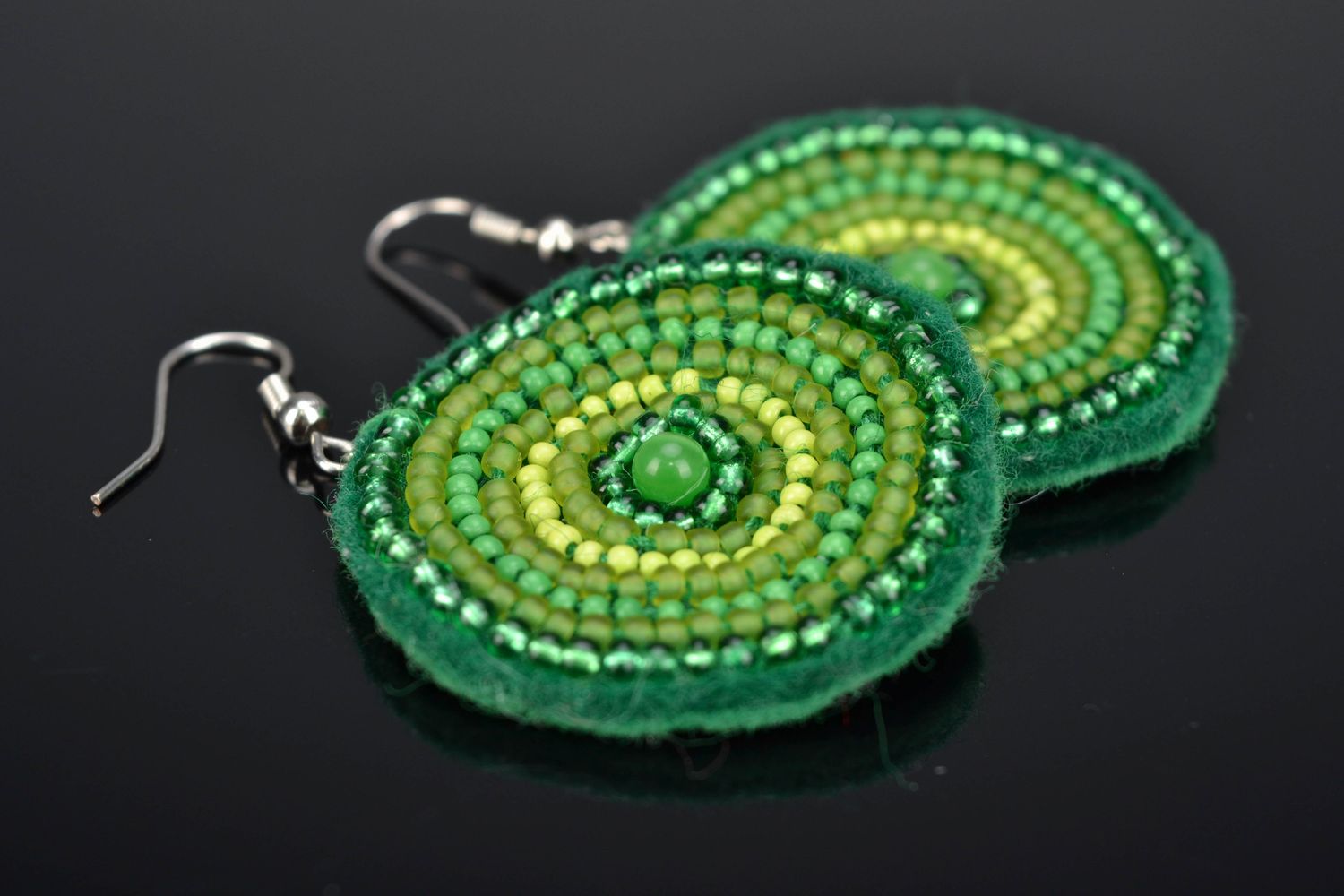 Green round embroidered beaded earrings photo 1
