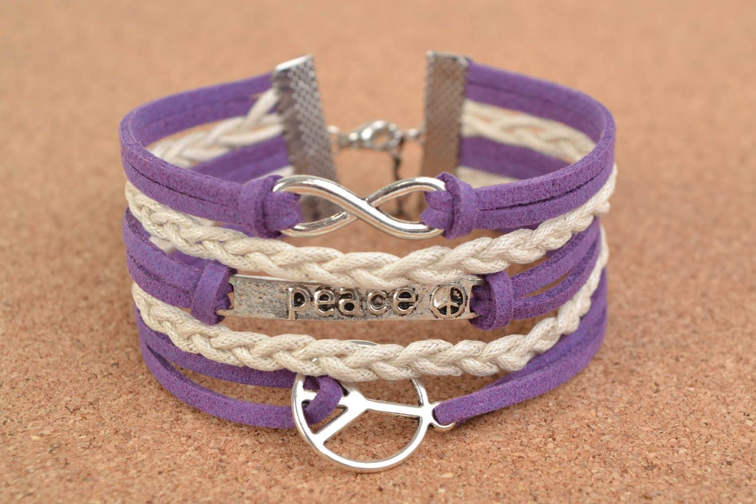 Handmade beautiful suede cord bracelet with metal charm and inscription Peace photo 1