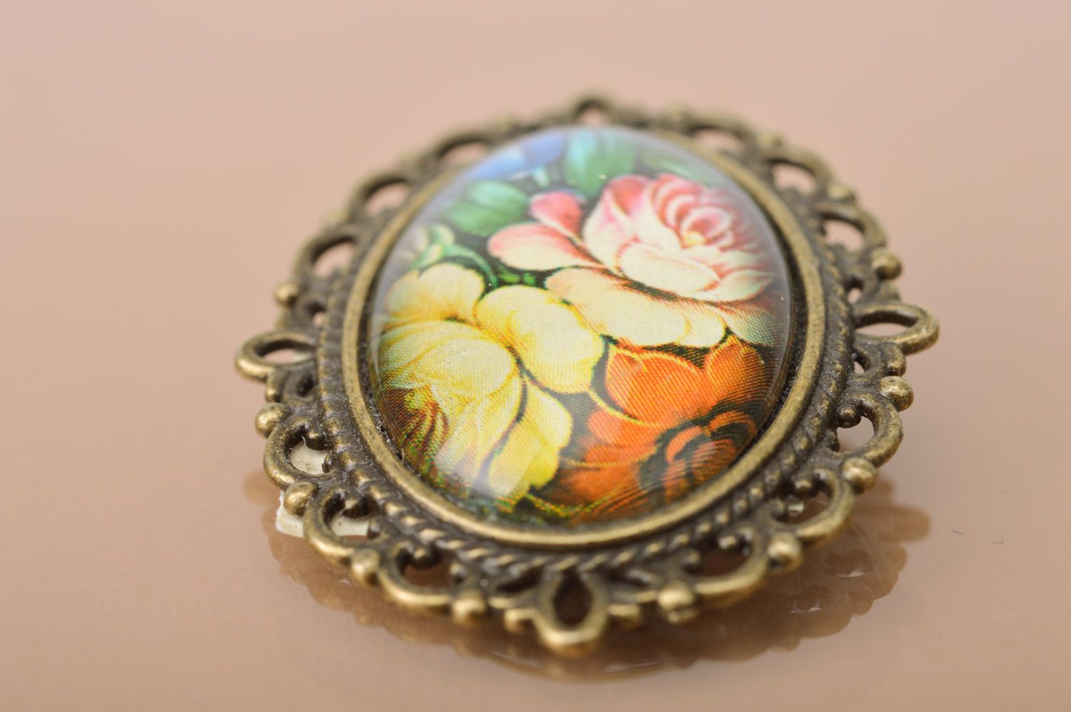 Handmade oval brooch with metal basis and floral pattern coated with glass photo 5