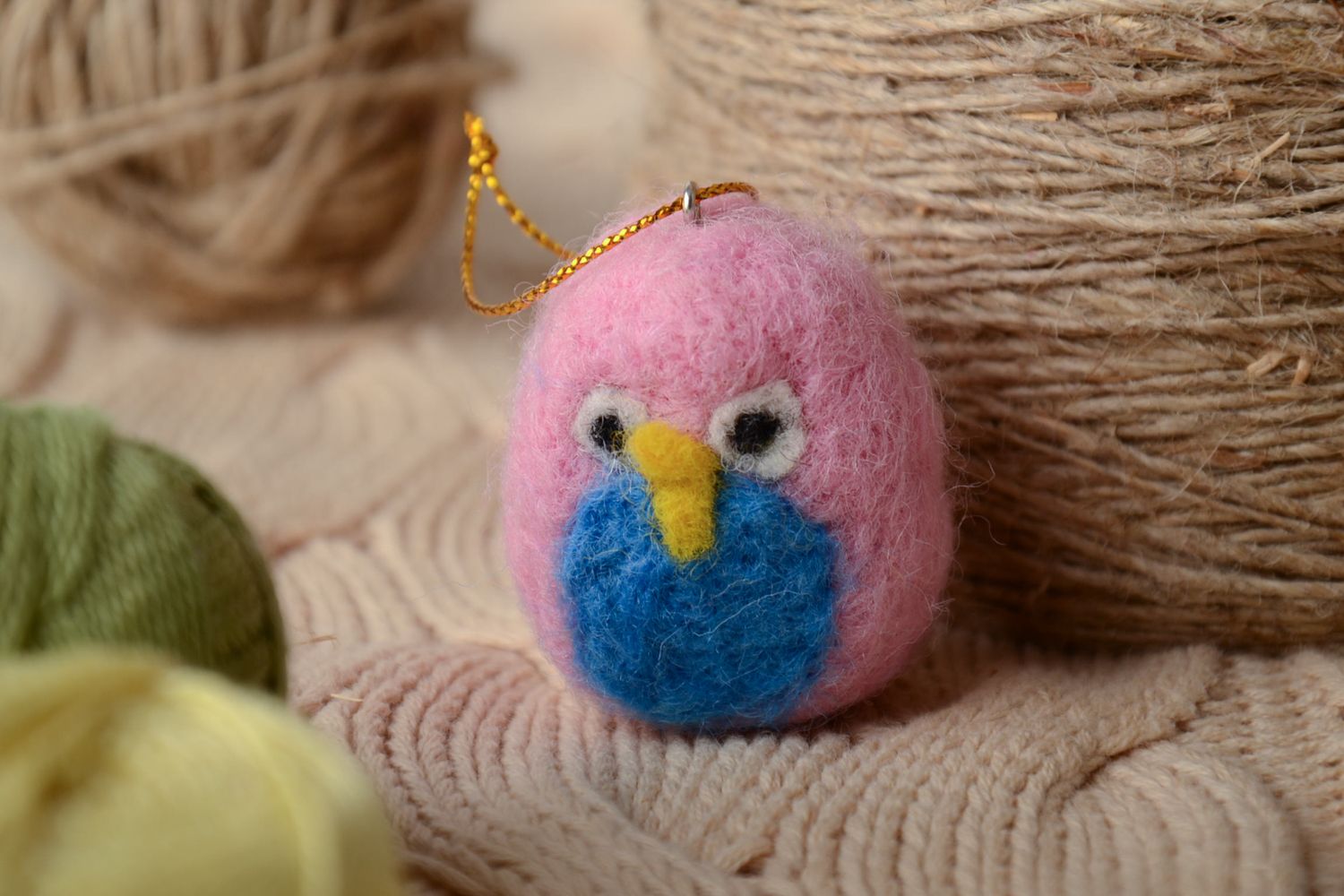 Felted wool toy bird with eyelet photo 1
