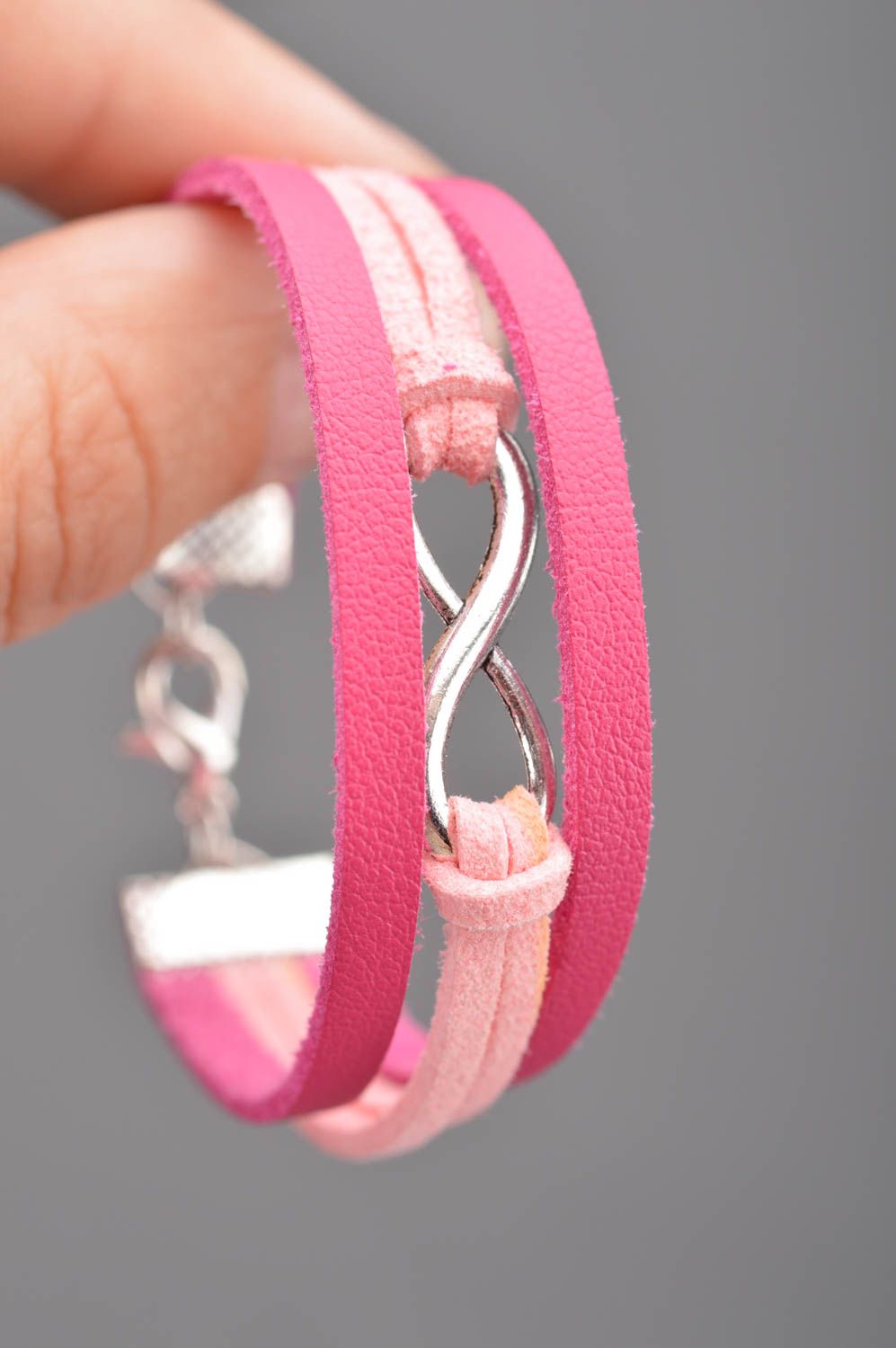Handmade designer pink wide leather and suede bracelet with infinity sign photo 5