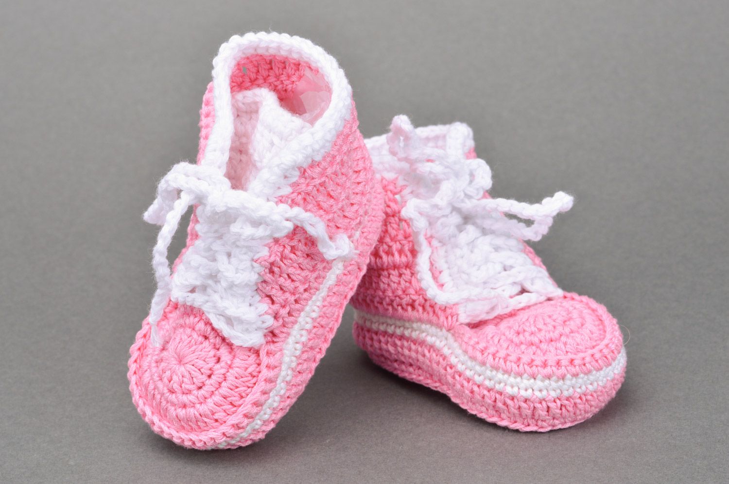 Handmade crocheted pink booties made of cotton in the form of sneakers for girls photo 5