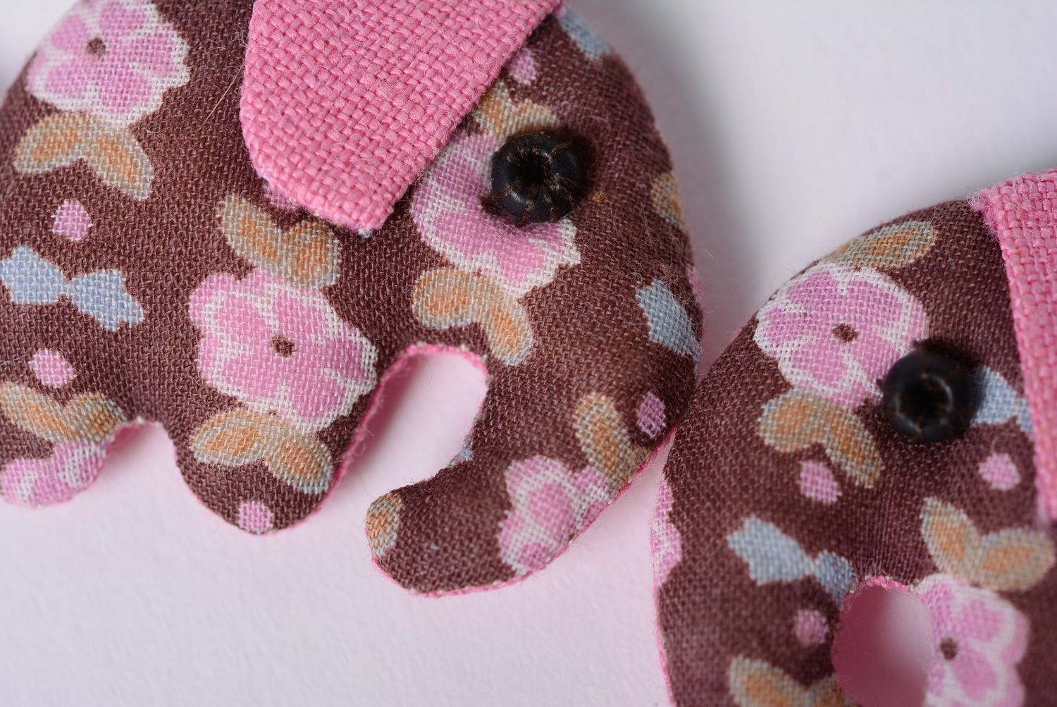 Handmade designer dangle earrings sewn of fabric elephants in pink color palette photo 2