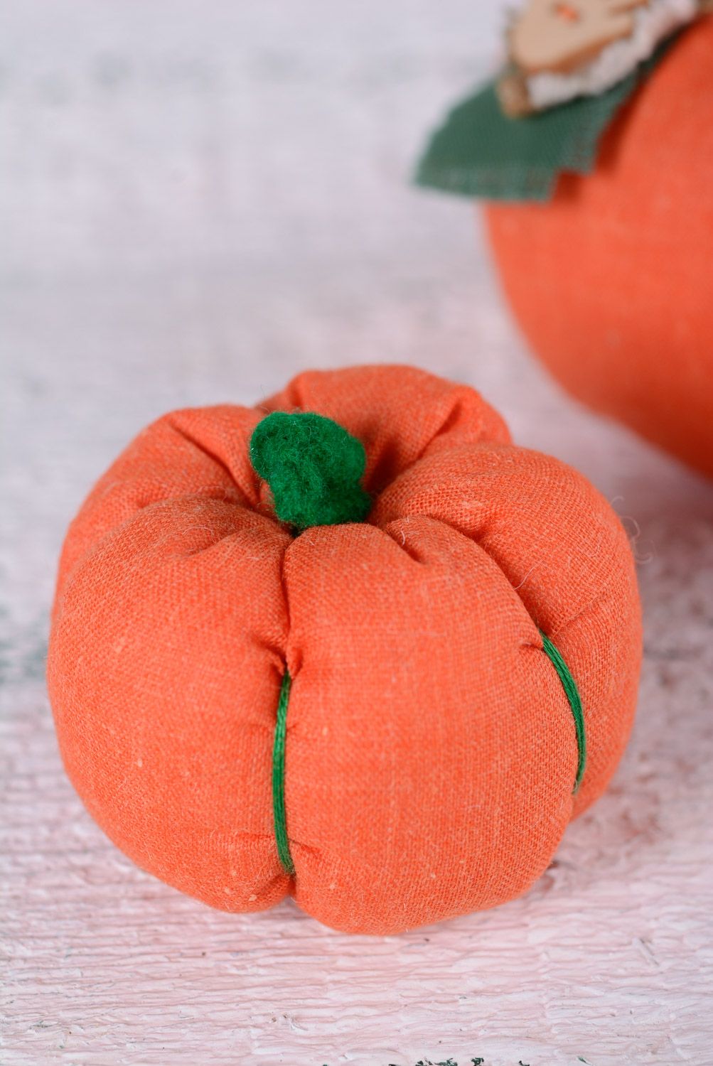 Handmade small soft toy sewn of linen in the shape of pumpkin for interior decor photo 1